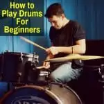 Beginner playing the drums